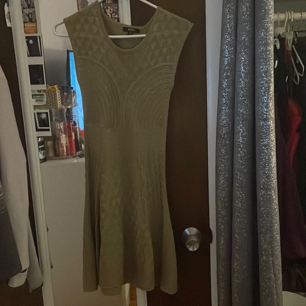 This is a gold dress the brand is xoxo size small never been Warn